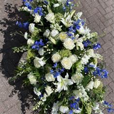 Blue and white spray