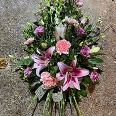 Pink lily tied sheaf