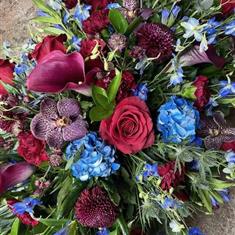 Claret and blue spray